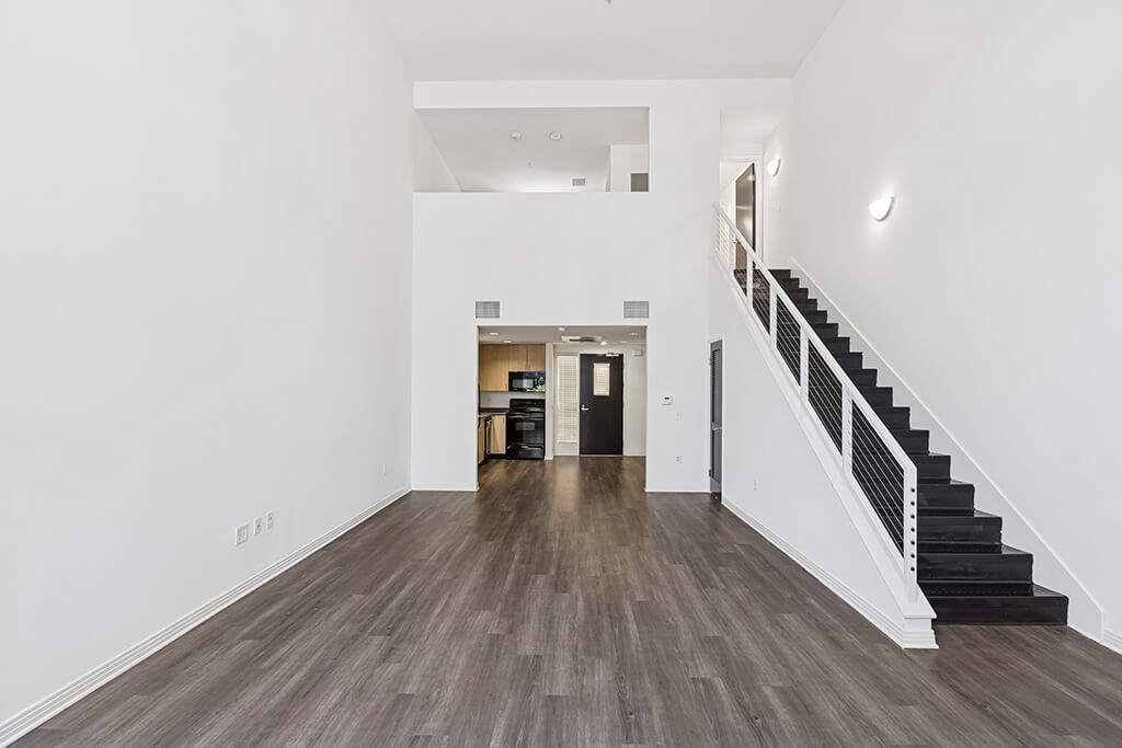 Living room with loft at Haven at Del Mar Station in Pasadena CA