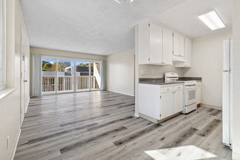 Dining Area and Living Room at Canyon Rim Apartments in San Diego CA