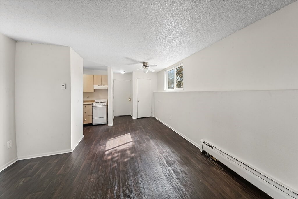 Vacant Living and Dining Room at The Pines in Lakewood CO