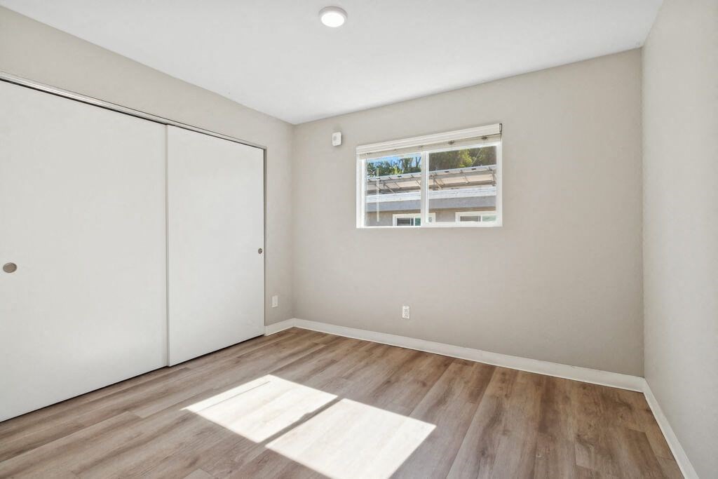 Main bedroom with closet at Park Crest Apartments in San Diego CA
