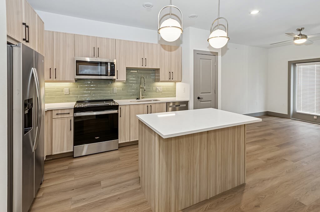 Vacant Sage Design Package Kitchen  at The Waylon Apartments and Townhomes in McKinney TX