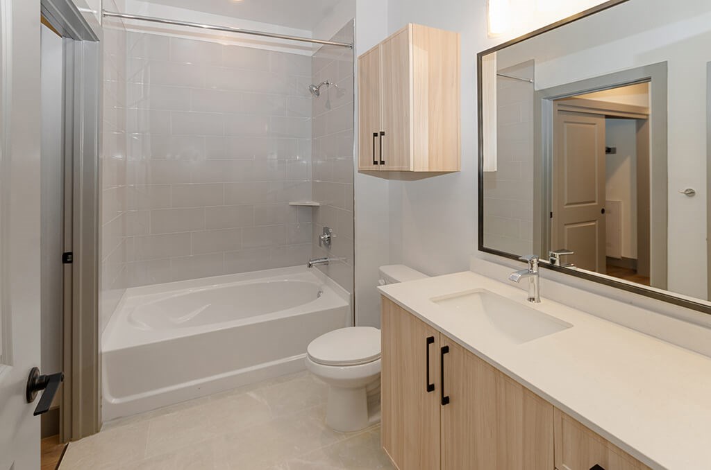 Vacant Sage Design Package Secondary Bedroom at The Waylon Apartments and Townhomes in McKinney TX