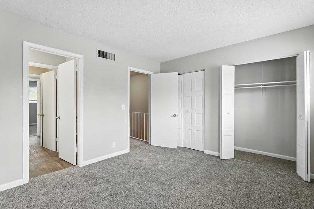 Vacant townhome bedroom with closet at City Side Flats Apartments in Nashville TN