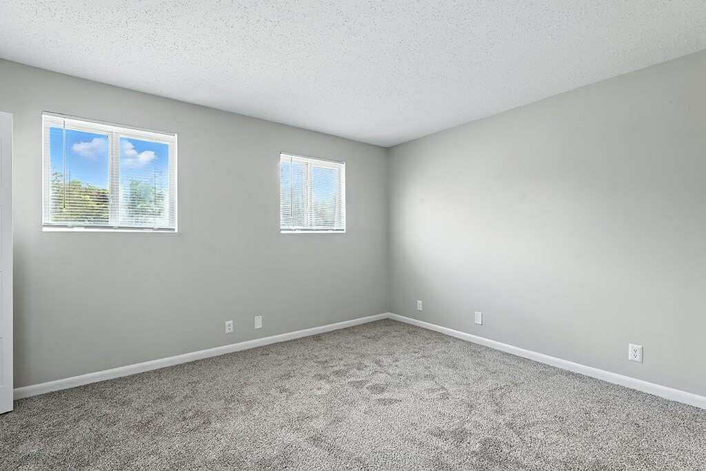 Carpeted bedroom at City Side Flats Apartments in Nashville TN