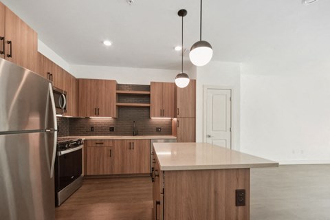 Kitchen with island at The Quill in Milford MA