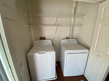 Unit washer and dryer at Riverwoods, Riverwoods at Towne Square, and Riverwoods at Lake Ridge in Woodbridge VA - Photo Gallery 8