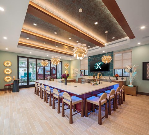 Poolside dining lounge at CALIXA Apartment Homes in Camarillo CA