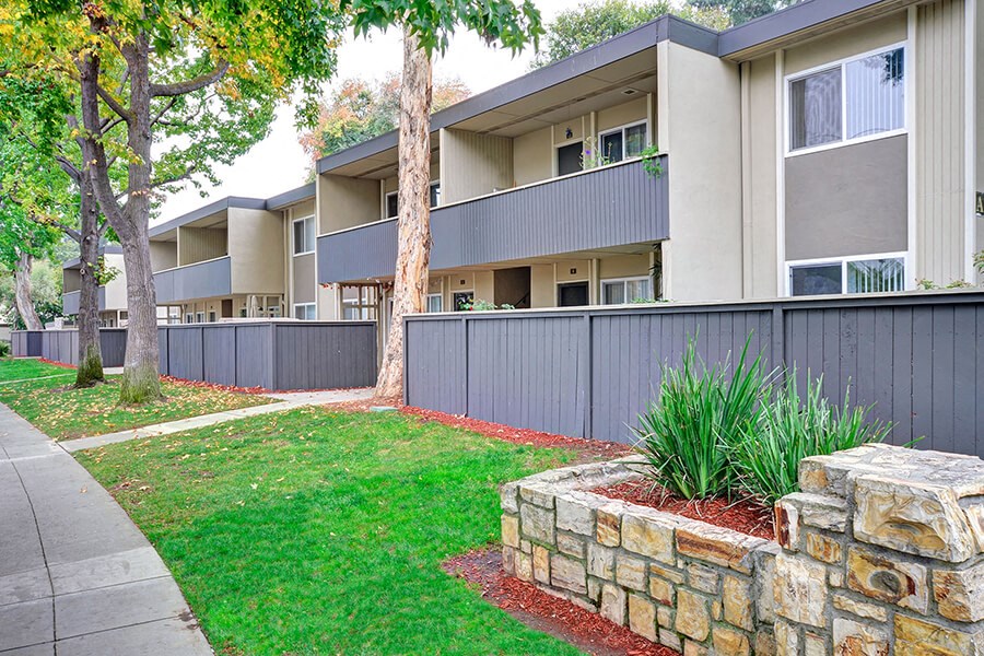 exterior shot of private balconies and patios at Trestles Apartments in San Jose, CA
