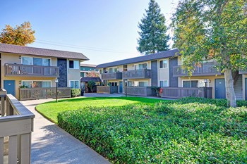 exterior shot showing off the private patios and balconies at Wyndover Apartment Homes in Novato, CA