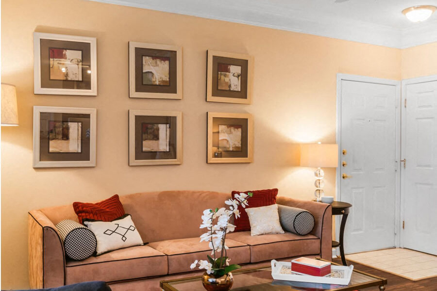 living room with 9' ceilings at River Pointe at Den Rock Apartments in Lawrence, MA