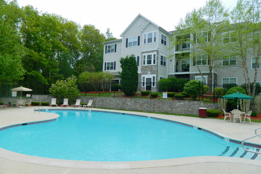 Large swimming pool at River Pointe at Den Rock Apartments in Lawrence, MA