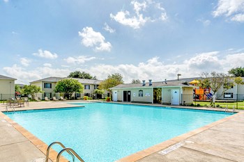 crystal clear pool at Paradise Oaks apartments in Austin TX - Photo Gallery 13