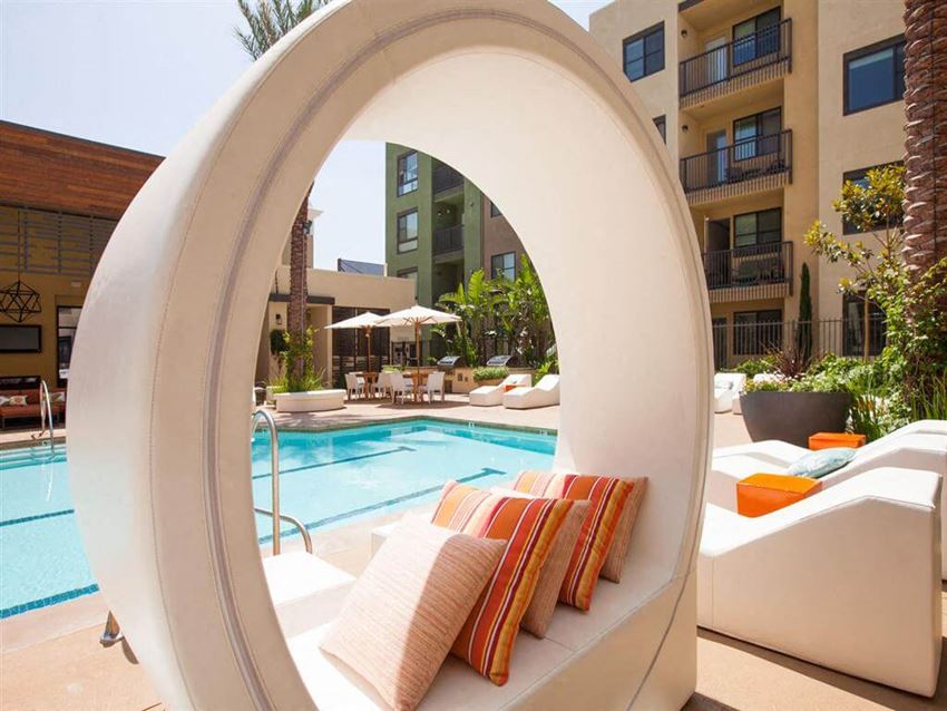 Covered pool seating at Terrena Apartments in Northridge, CA - Photo Gallery 1