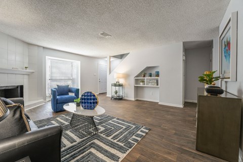 a living room with a couch and a table