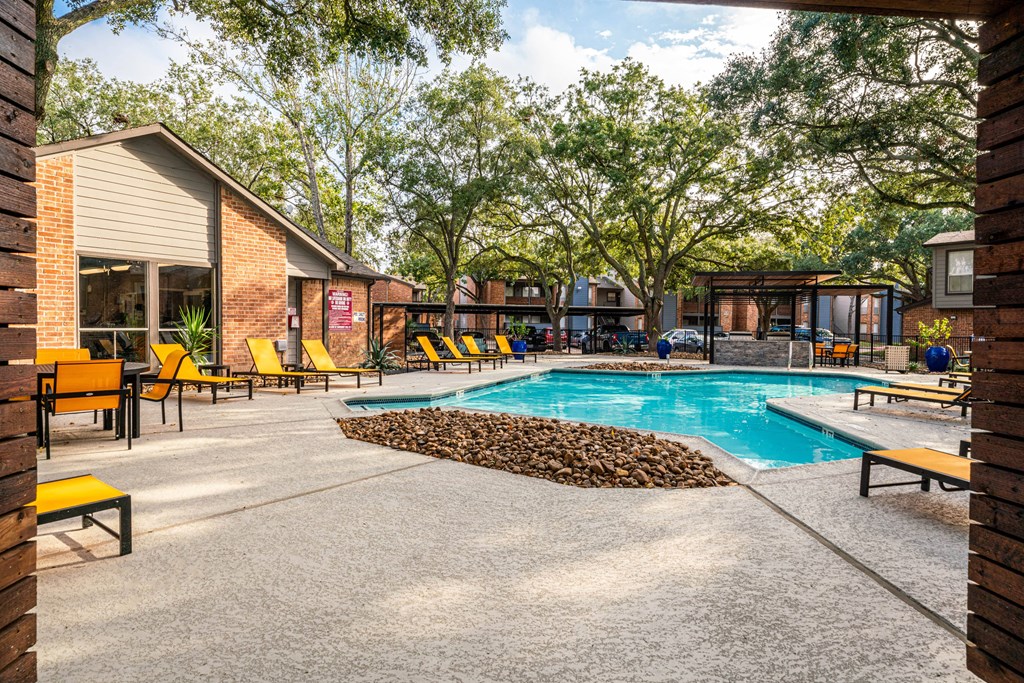 our apartments have a pool and lounge areas with chairs