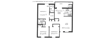 A black and white image of a floor plan for a three bedroom apartment.