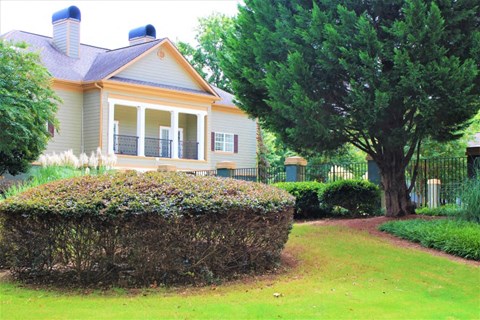 a house with a yard and a tree