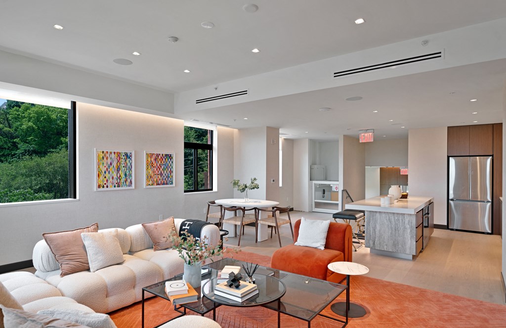 a living room with a couch and a table