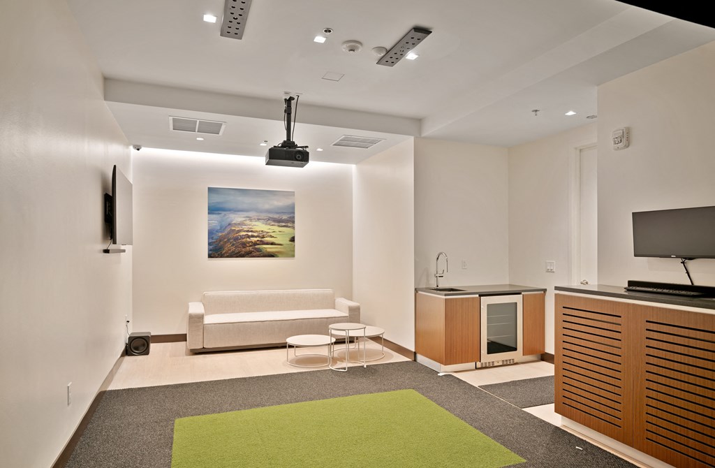 a living room with a couch and a television