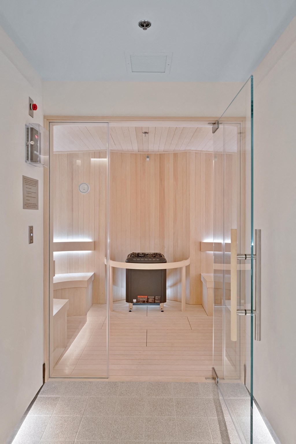 a conference room with a table and a glass door