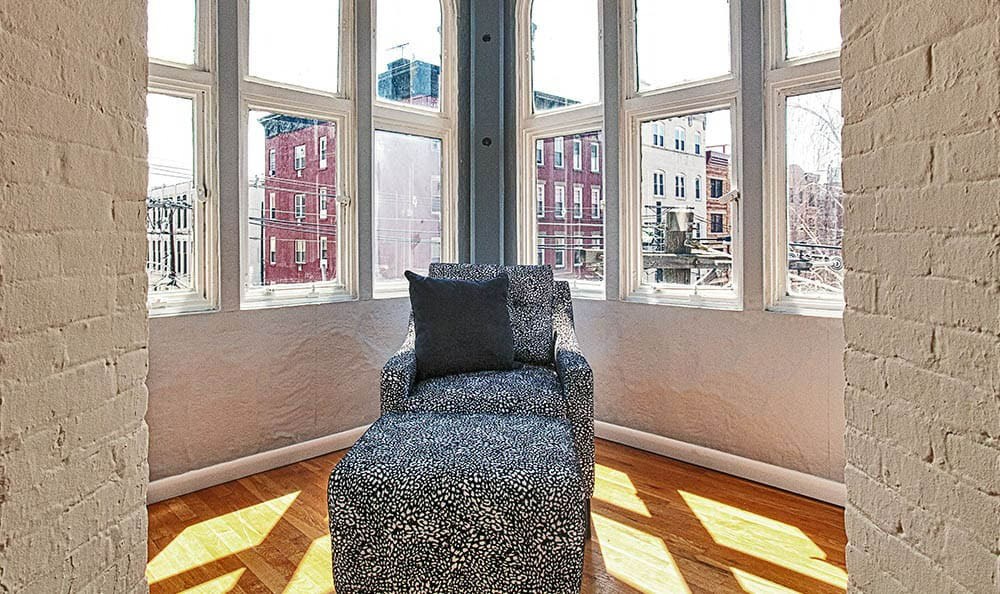 Sunroom Chair at Grand Adams Apartment Owner LLC, Hoboken