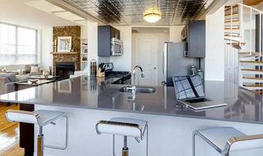 Stylish Kitchen With Bar Stools at Grand Adams Apartment Owner LLC, Hoboken, 07030 - Photo Gallery 4
