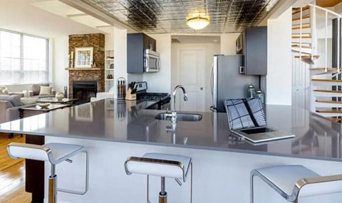 Stylish Kitchen With Bar Stools at Grand Adams Apartment Owner LLC, Hoboken, 07030
