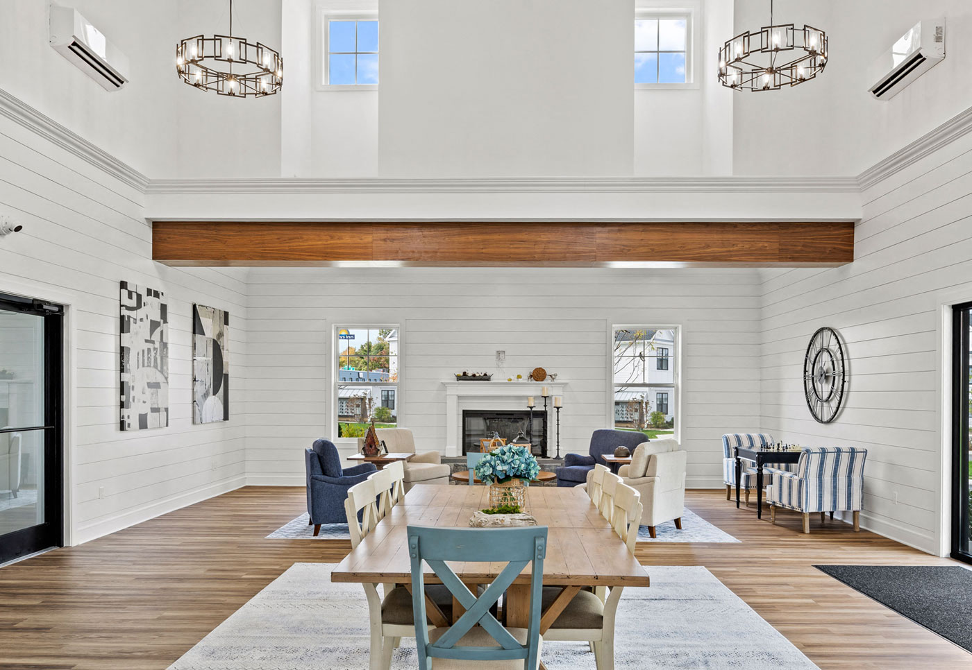 A dining room with a wooden table and chairs.