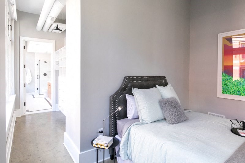 Bedroom with Gray Walls and a White Bed at Fourteen56, Detroit, MI