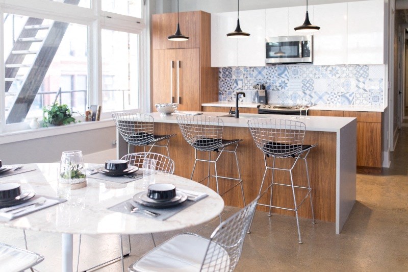 Kitchen with a Large Island and Dining Table at Fourteen56, Detroit, MI