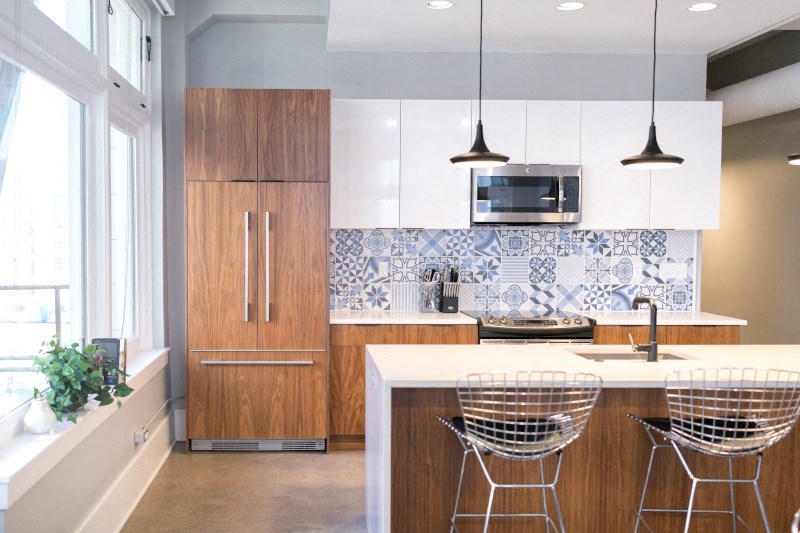 Kitchen with Wooden Cabinets and Island at Fourteen56, Detroit, MI