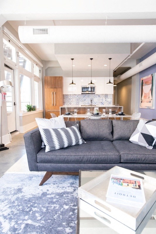 Living Room with a Grey Couch at Fourteen56, Detroit, MI