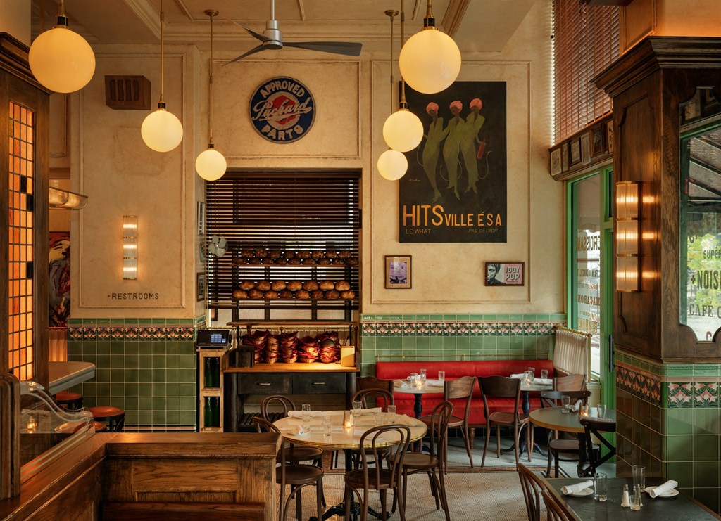 the interior of a restaurant with tables and chairsat Book Tower, Detroit, Michigan