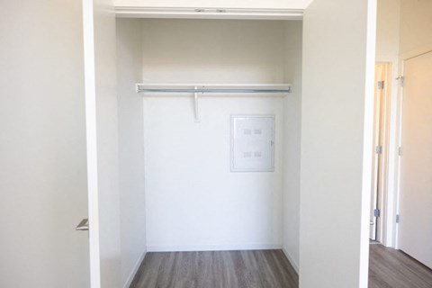 a walk in closet in a 555 waverly unit
