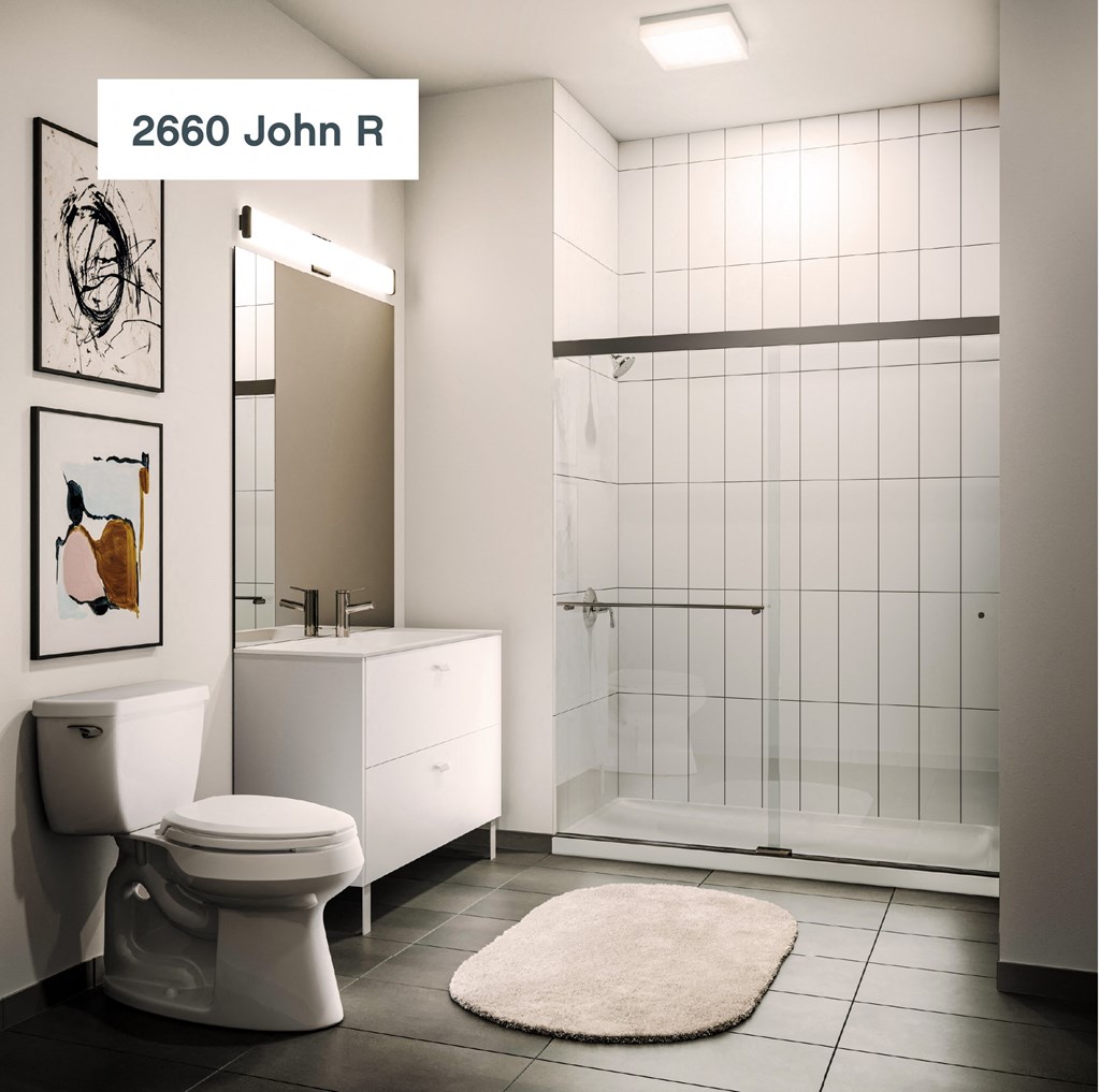 an image of a bathroom with a shower and toilet