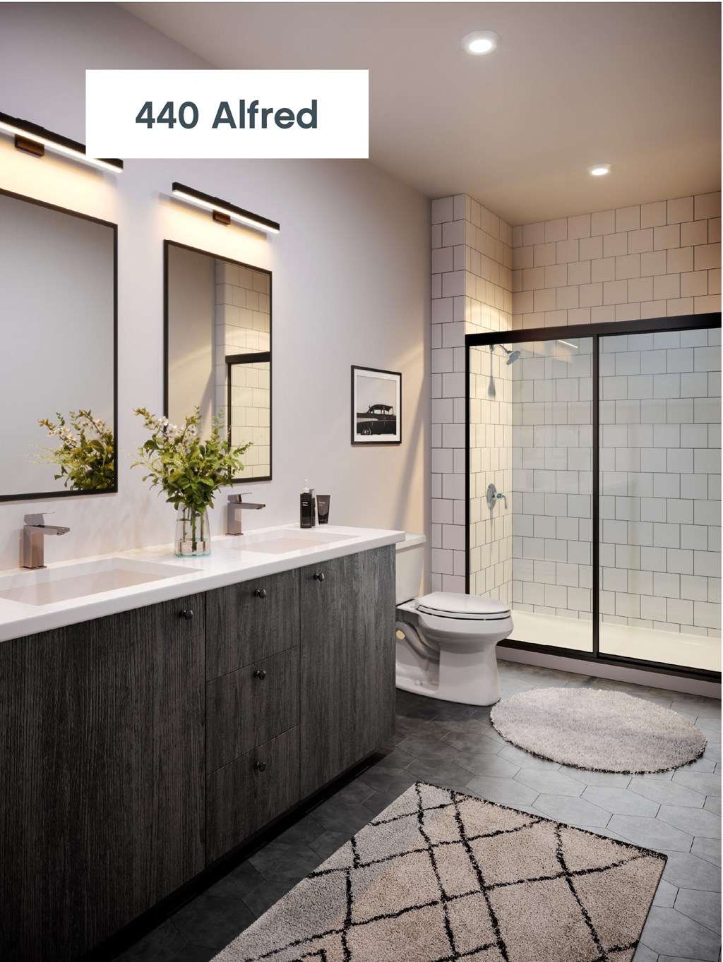 a bathroom with a toilet and a sink and a shower