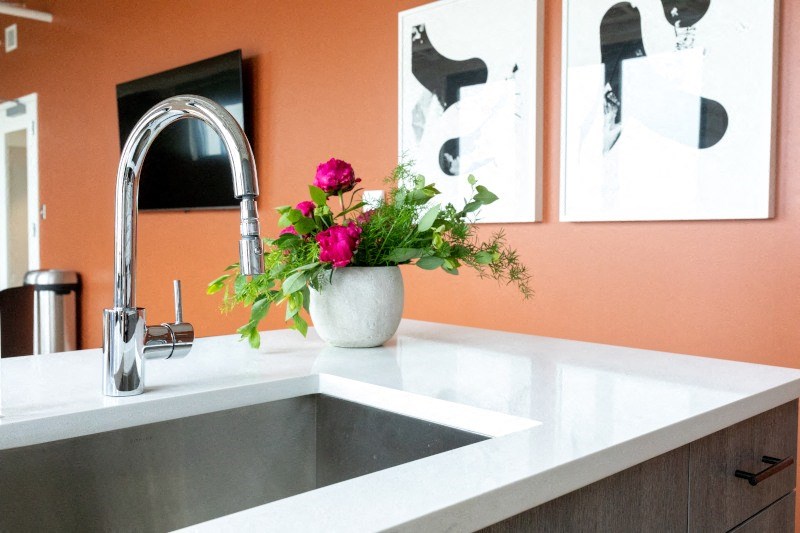 Kitchen Sink with a Vase of Flowers at The Assembly, Detroit, MI