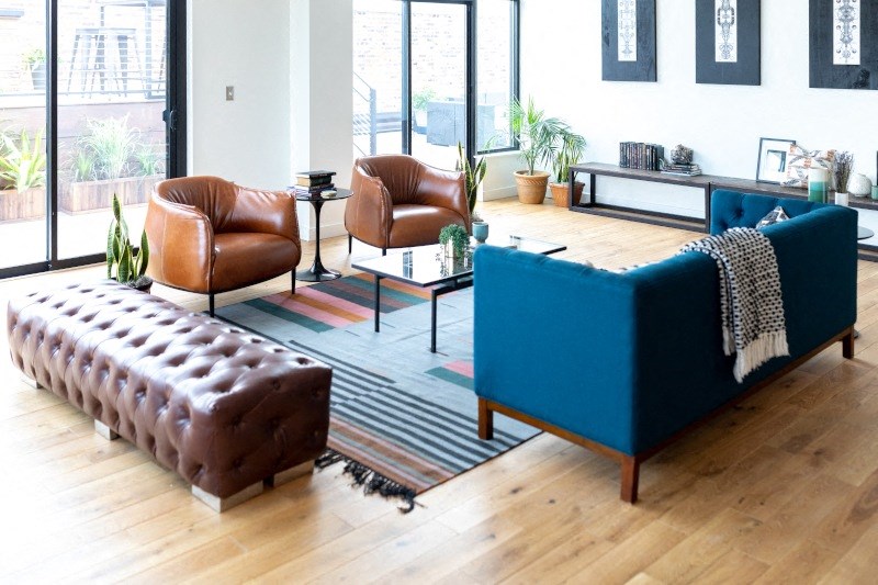 Seating Area With Blue and Brown Chairs at The Assembly, Detroit, MI