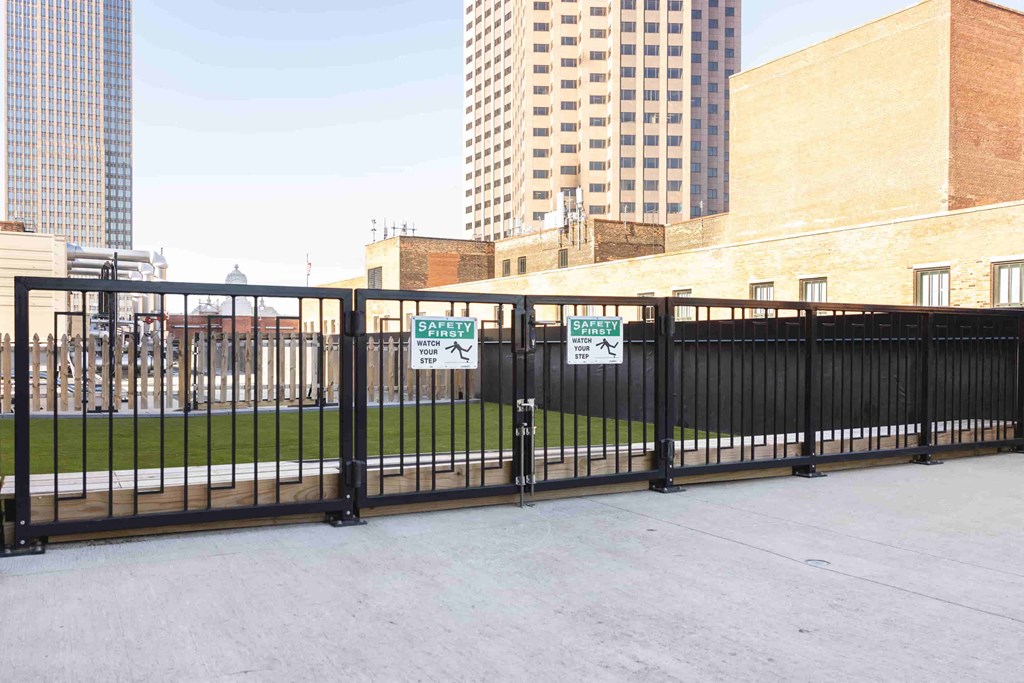 Outdoor pet relief dog park area. at The May, Cleveland, OH, 44114