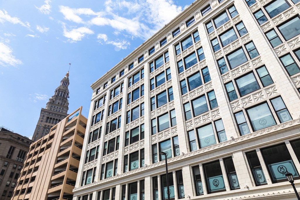 Architectural details on the exterior of The May during the daytime.