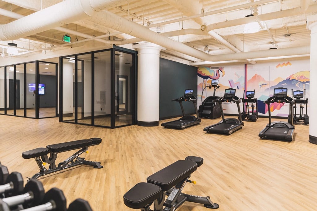 State Of The Art Fitness Center Indoor fitness area at The May, featuring a variety of state of the art gym equipment.