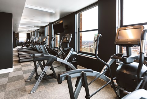 The Stott gym with treadmills and elliptical machines.