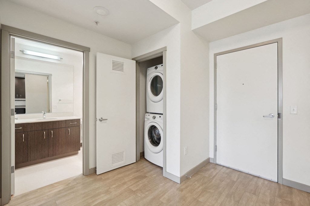 A laundry room with a washer and dryer.
