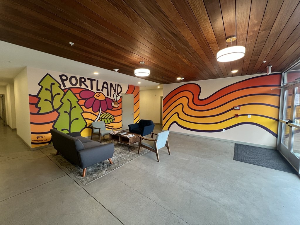 A brightly colored mural with the word "Portland" written on it.