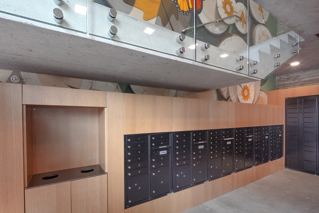 a view of the lockers in a room with a painting on the wall at The Weidler in Portland, OR 97209