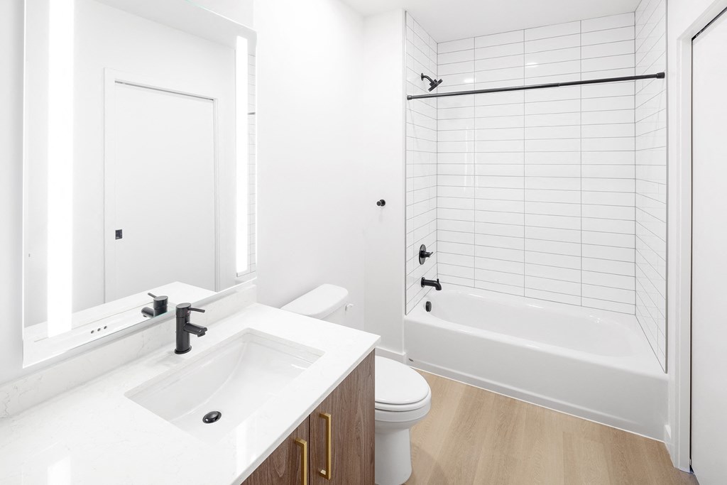 a bathroom with a sink toilet and a shower at The Weidler in Portland, OR 97209