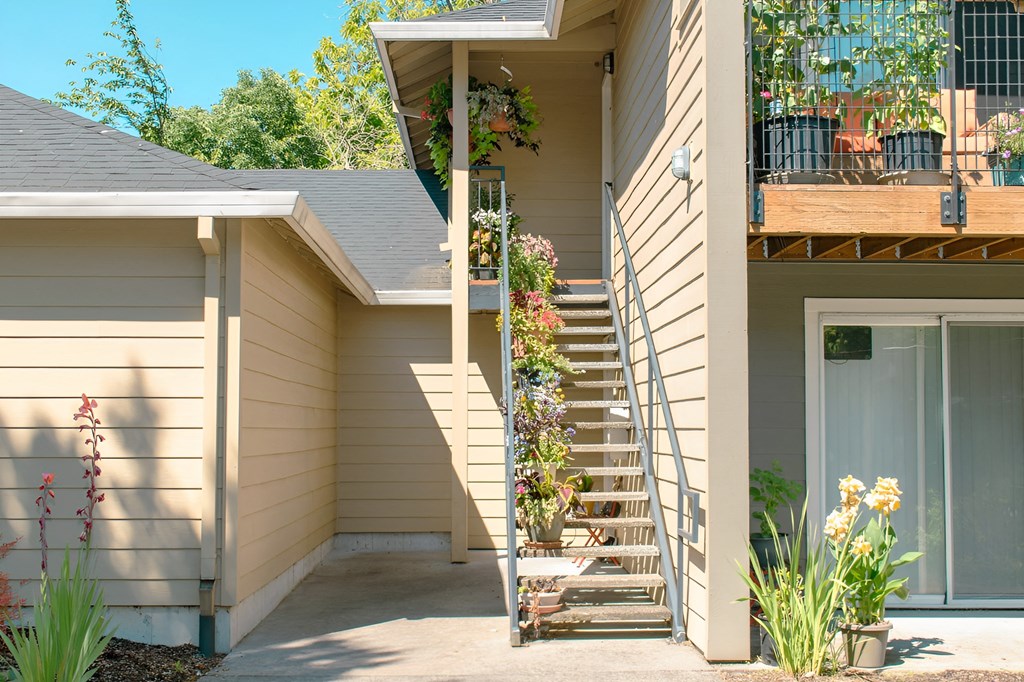 A house with a staircase leading to the second floor.
