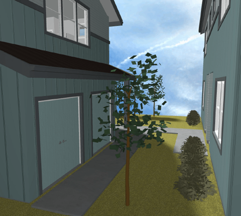 A tree in front of a house with a grey door.