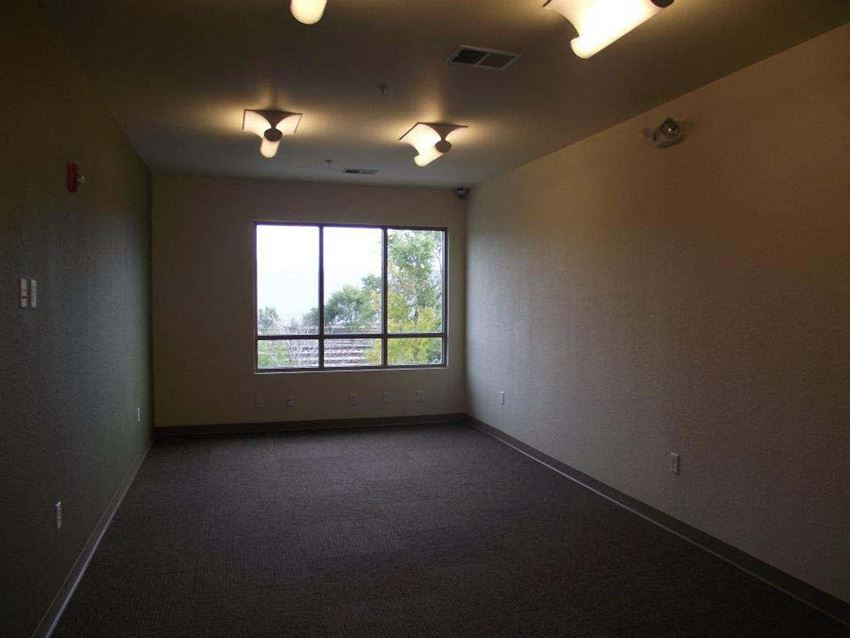 Interior an empty room with a large window in it