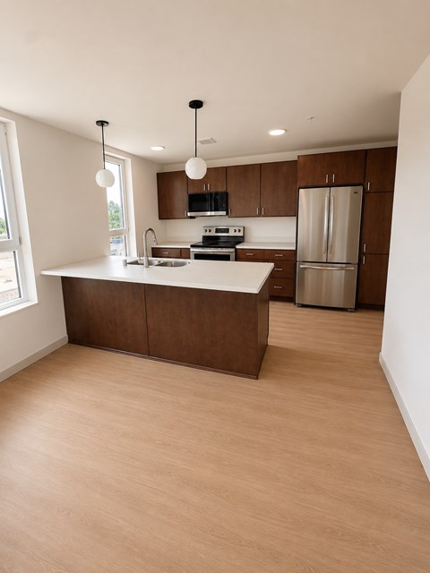 A kitchen with wooden cabinets and a white countertop.